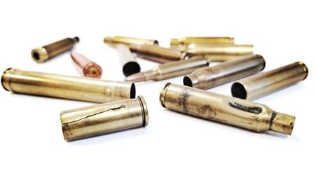 Ammunition problems. Bullet casings with various imperfections.