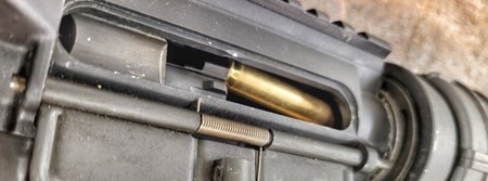 A round fails to chamber in a semi-automatic firearm.
